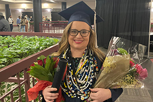 Collins graduates with associate degree amid battle with brain tumor